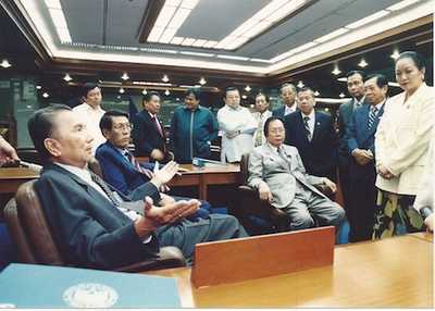 In a huddle with co-senators at the Philippine Senate. 
Photo taken from the Marcelo B. Fernan Library.